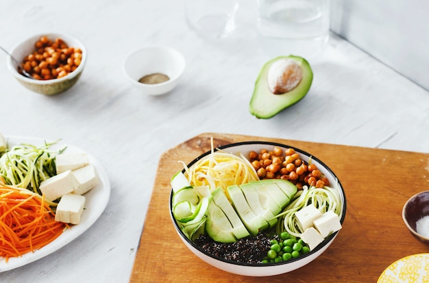 Vegetarian bowl buddha with spiralized vegetables, avocado, chickpeas and quinoa