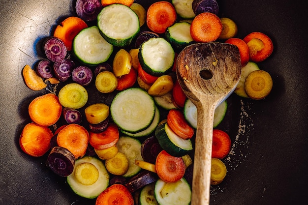 Vegetarian dinner vegetable pan, colorful carrots, zucchini, top view