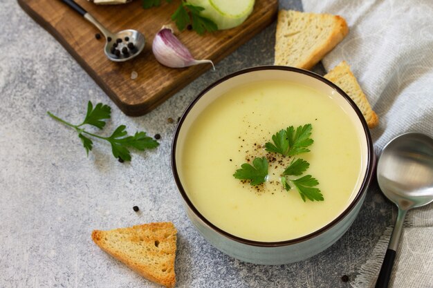 Vegetarian dish Dietary Tasty Summer cream soup Zucchini on a light background