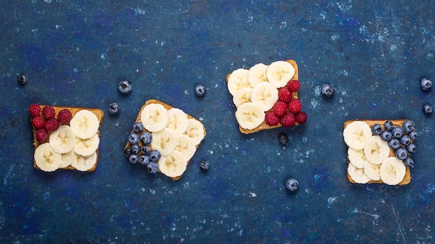 Vegetarian Lunch Sandwich with Peanut Butter, Banana, Raspberry and Blueberry