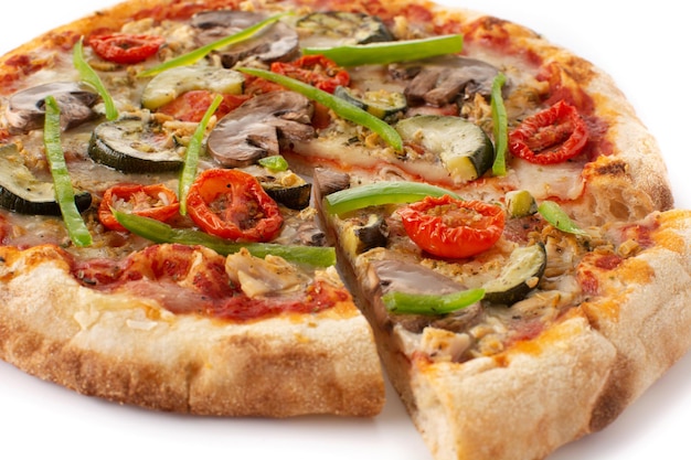 Vegetarian pizza with zucchini tomato peppers and mushrooms