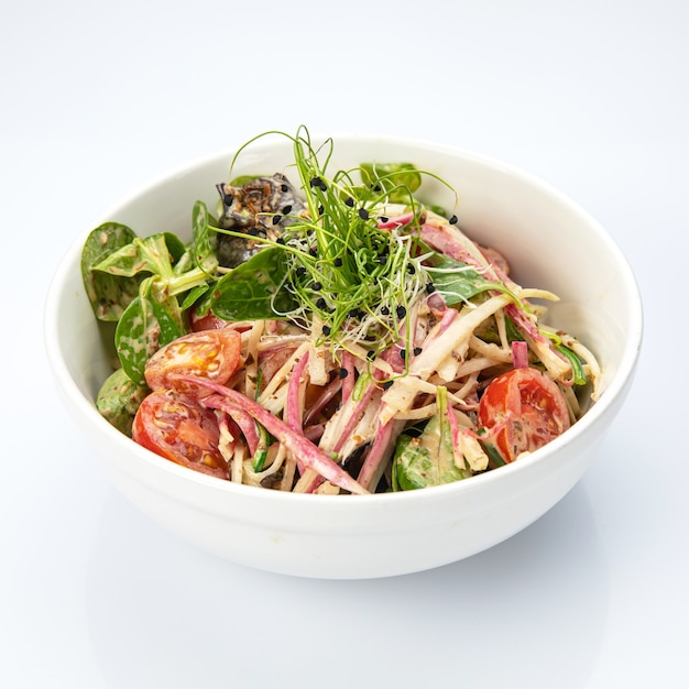 Vegetarian salad on a white isolating background