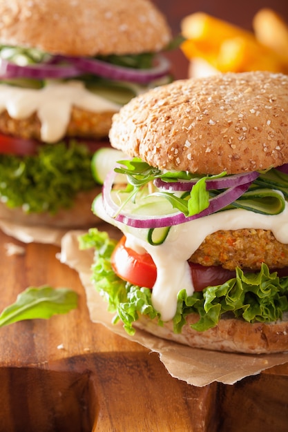 Veggie carrot and oats burger with cucumber, onion and tomato