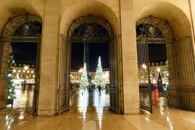 Vendome column with statue of Napoleon Bonaparte on the Place Vendome decorated for Christmas at rai