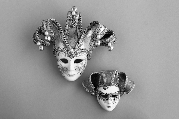 Venetian carnival mask on the gray background Top view Copy space