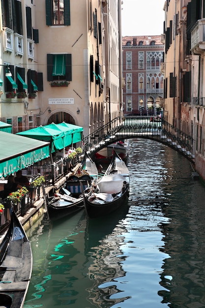 Venice canal and restaurant with gondolas