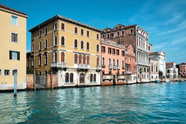 Venice, Italy. Historic houses reflects in the water, traditional architecture on Grand Canal in Venice.