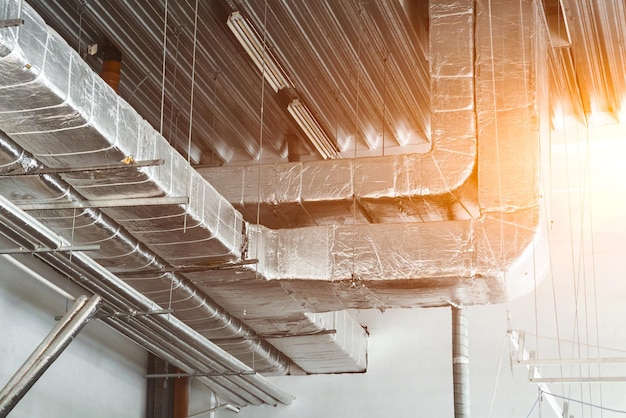 Ventilation and air conditioning shafts on the ceiling in the building