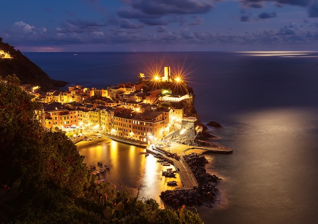 Vernazza city  pier and boats at night in Cinque Terra in Liguria Italy