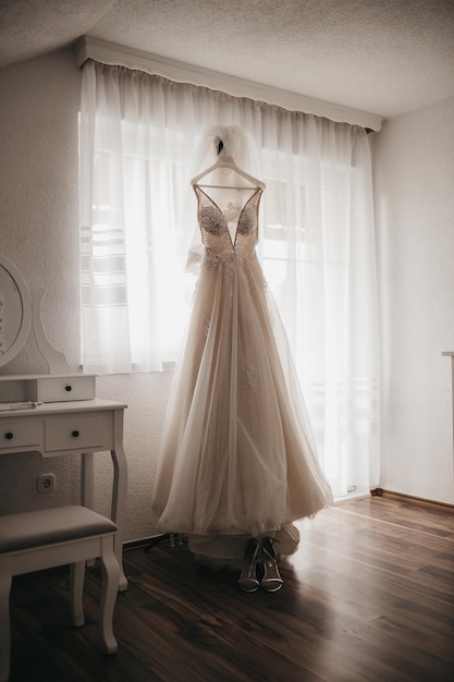 Vertical closeup shot of a beautiful white wedding dress