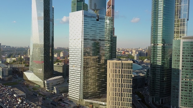 A vertical inspection of beautiful skyscrapers near the busy highway