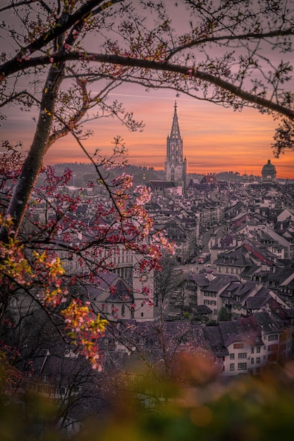 Vertical shot of the cityscape old town of Bern during a spring sunset, Switzerland