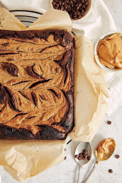 Vertical shot of delicious peanut butter swirl brownies