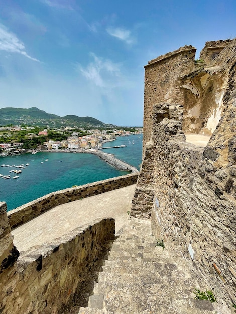 Vertical shot of medieval Aragonese Castle of Ischia in Italy