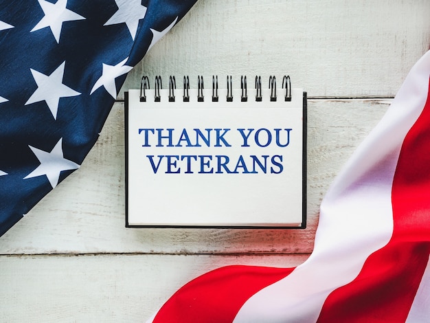 Photo veterans day. american flag lying on the table