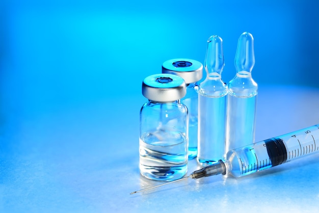 Vials ampules and syringe