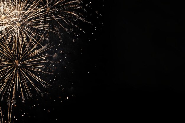 Vibrant fireworks against a black background for new year s or festive celebrations on social media