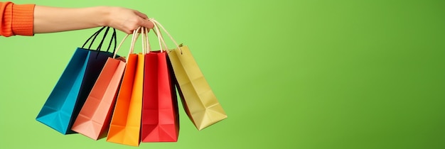 A vibrant photograph capturing a Female Hand holding many Colorful Shopping Bags