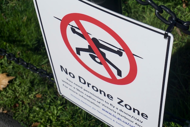 VICTORIA CANADA SPETEMBER 26th 2018 No drone zone sign attached to a fence in an urban city centre