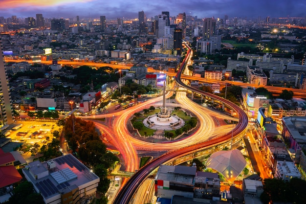 Victory monument Thailand in Bangkok city with sunset and building background, view point from rooftop of hotel in Bangkok.