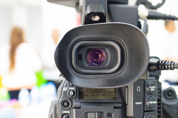 Video camera that is recording a group of people