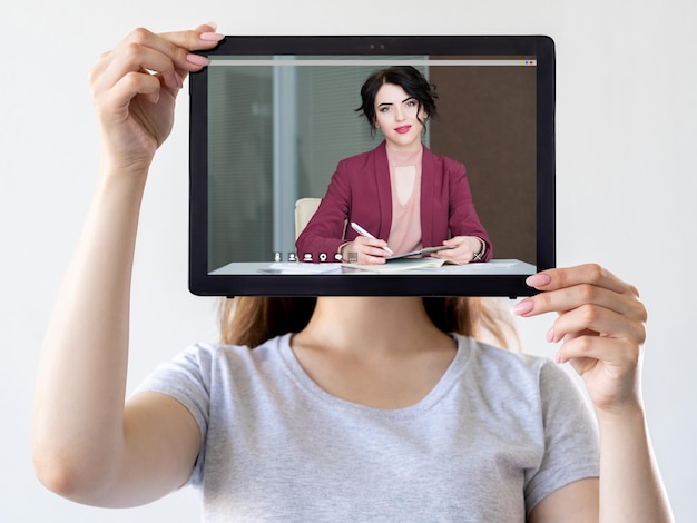 Video meeting business coaching woman on tablet