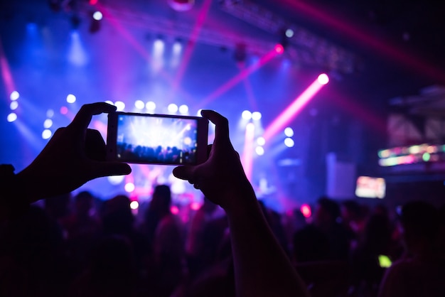 Video recording of the concert on the phone a smartphone. 