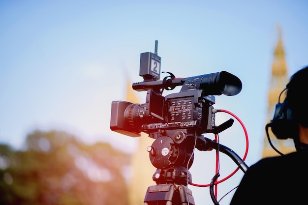 The videographer shoots behindthescenes photos of the production