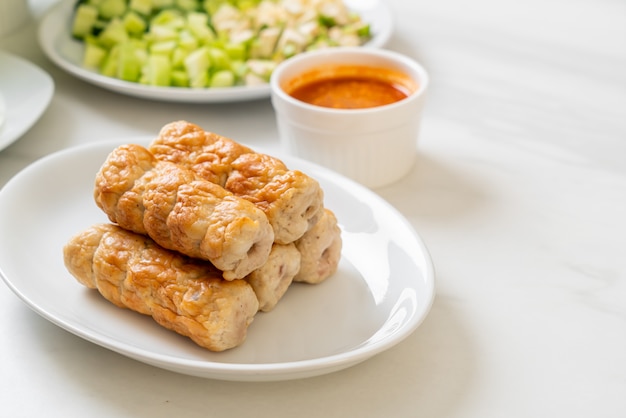 Vietnamese pork  meatball with vegetables wraps (Nam-Neaung or Nham Due)