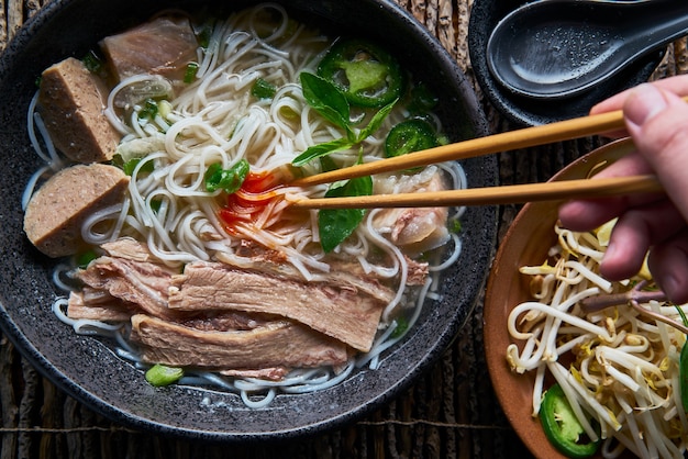 Vietnamese soup on a bowl