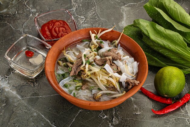 Vietnamese traditional soup Pho Bo with beef