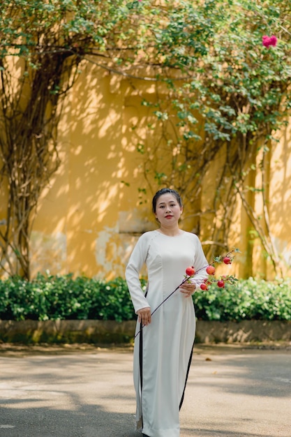 Photo vietnamese woman wearing national dress ao dai portrait