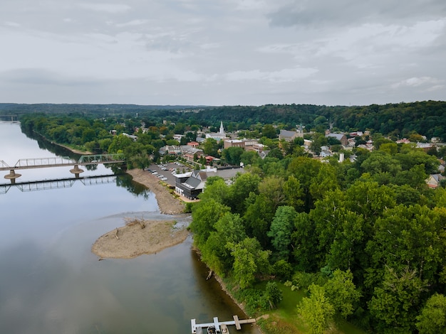 The view of aerial Delaware river, bridge across the in the historic city New Hope Pennsylvania and Lambertville New Jersey USA