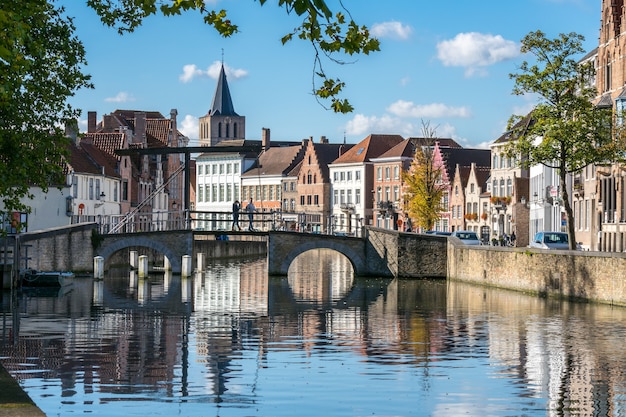 View along a canal in Bruges West Flanders in Belgium