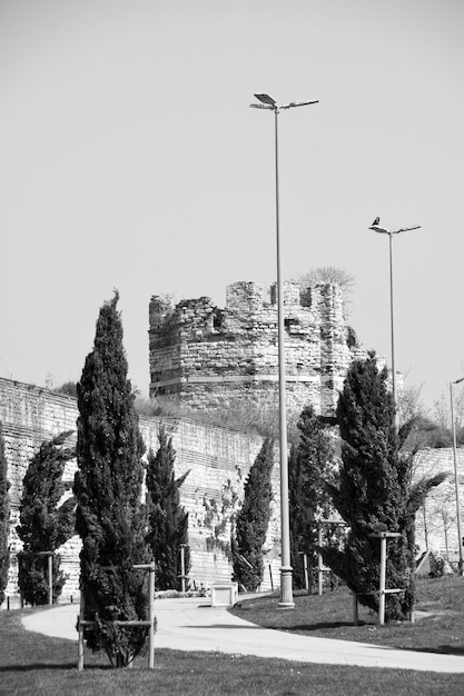 View of Arabaci Beyazit park and old walled tower in Istanbul April 14 2022 Istanbul Turkey