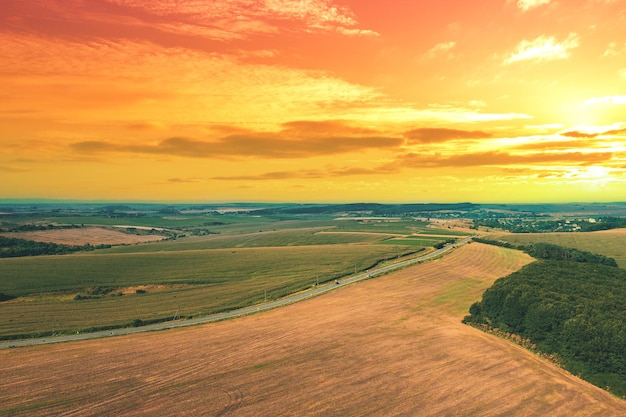 View of the arable field during sunset Rural landscape