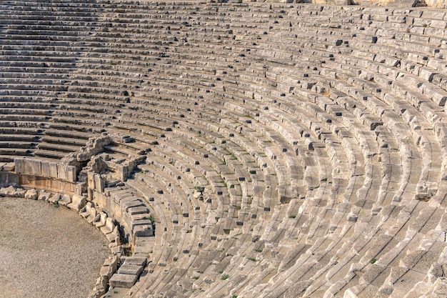 View of the arena and stands of the antique amphitheater in the ruins of Myra Lycian (Demre, Turkey)