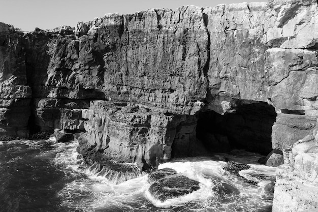 View of the beach and ocean on the day Portugal Black and white image