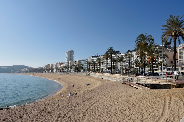 View of beach and village of LLoret de Mar Costa Brava Girona province Catalonia Spain