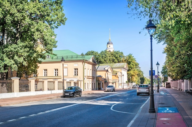 View of the bell tower of the Great Ascension Church from Bolshaya Nikitskaya Street in Moscow