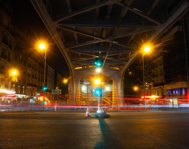 View of bridge Bir-Hakeim called Pont de Passy at night in Paris. France