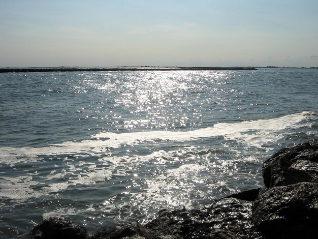 View of bright sea waves and blue sea Natural landscape