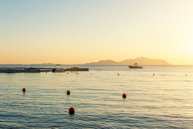 View of calm beautiful sea during sunset Holiday vacation and travel concept