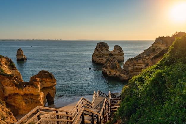 View of Camilo beach, at sunrise, in Lagos in the Algarve.