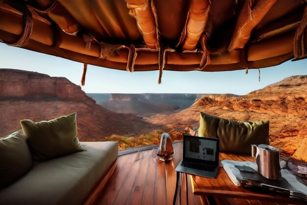 Photo a view of a canyon with a laptop and a laptop on a table