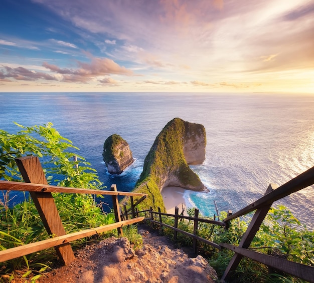 View on the cape during sunset Seascape during the sunset Beach and ocean Kelingking beach Nusa Penida Bali Indonesia Travel image