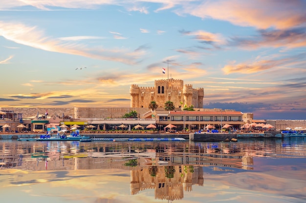 View of the Citadel of Qaitbay and beautiful Mediterranean sea coast in Alexandria Egypt