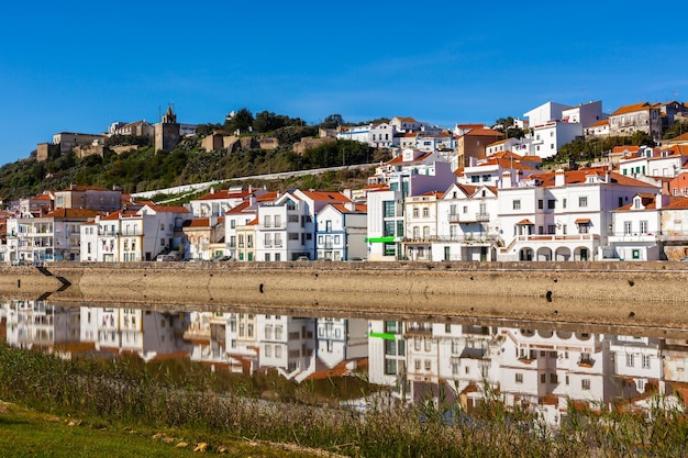 View of city Alcacer do Sal near the river Sado in Portugal