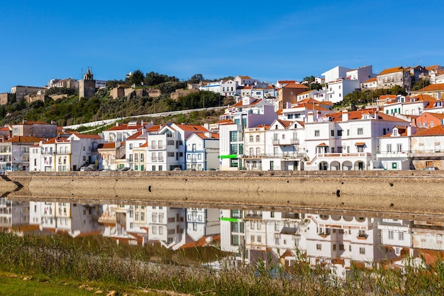 View of city Alcacer do Sal near the river Sado in Portugal