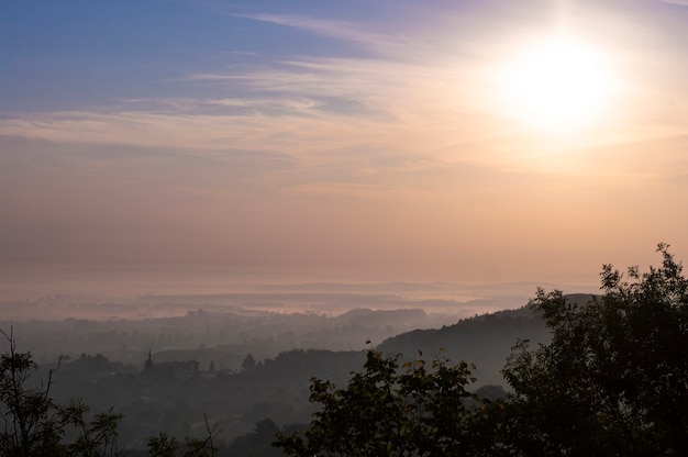 View of the city from high in the morning in the fog